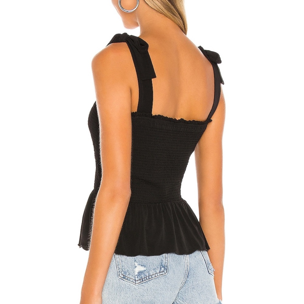 Worn once from revolve 1.state black tie shoulder smocked peplum knit top